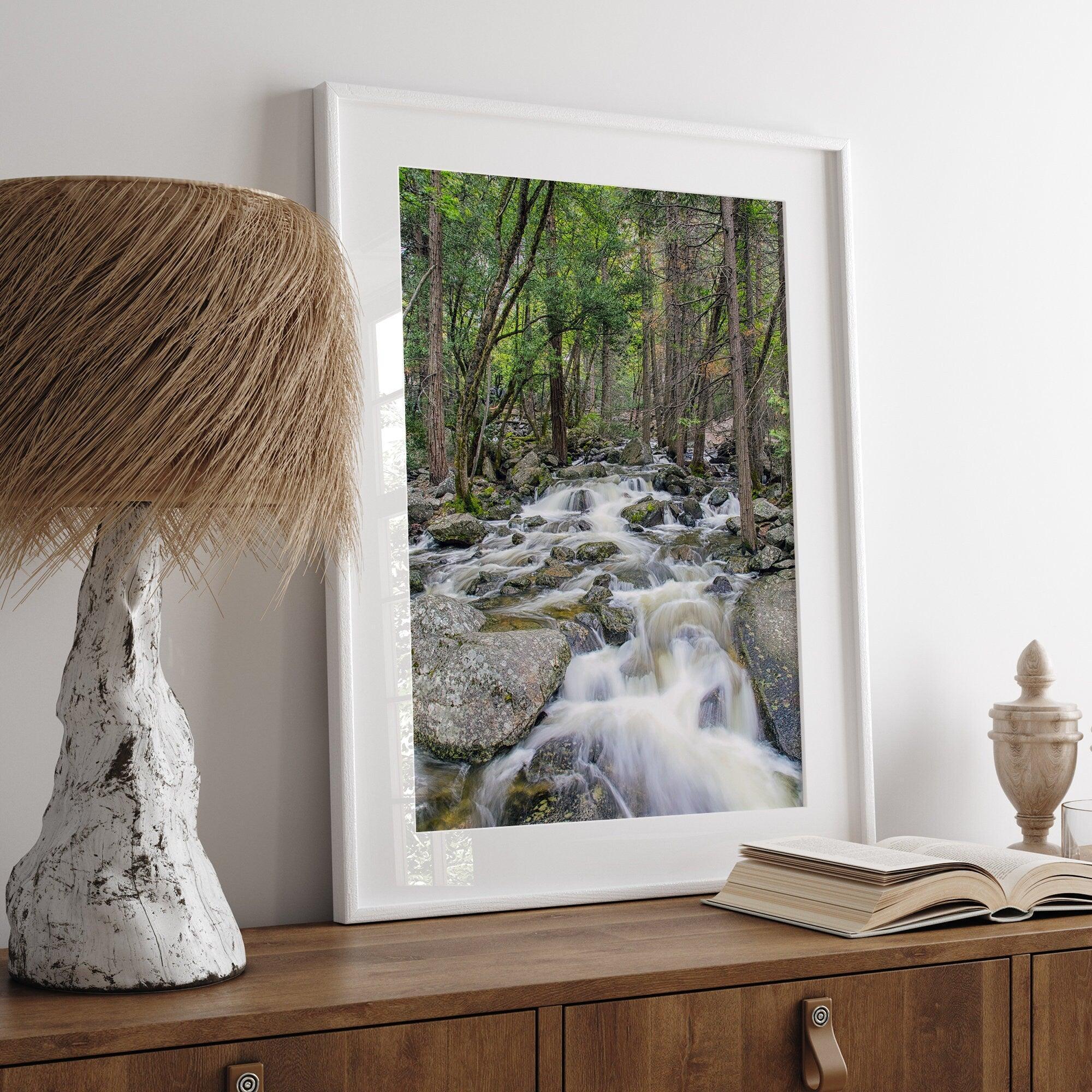 A beautiful river cuts through the forest, shot in long exposure making the water look creamy and calm in this fine art Yosemite National Park print.