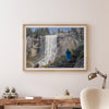 Climb the breathtaking Mist Trail in Yosemite National Part with this fine art waterfall nature print. This nature landscape wall art showcases the stunning gushing waterfall and the people scaling the trail with their colorful raincoats.
