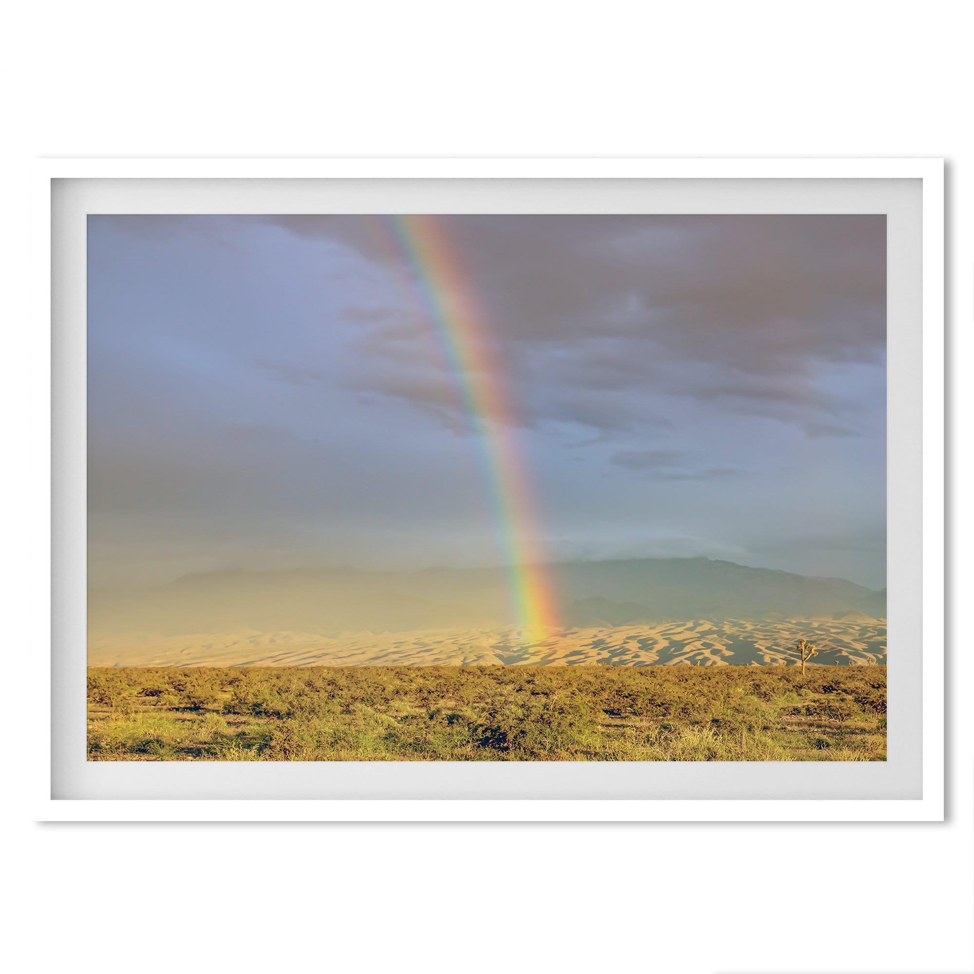 A fine art unframed or framed Arizona desert print showcasing a beautiful rainbow and cloudy sky in the middle of the desert landscape.