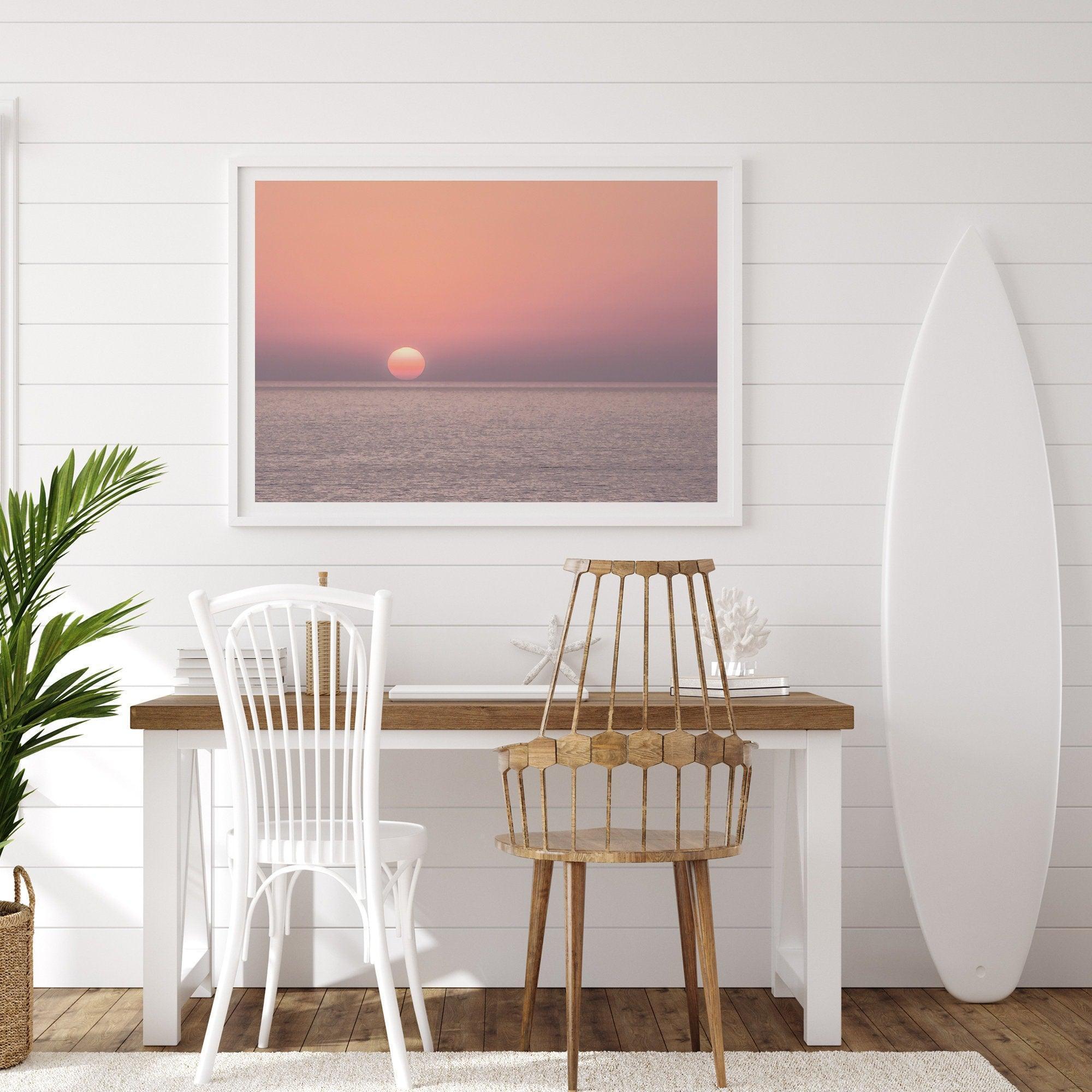 A fine art abstract ocean sunset print featuring rich shades of red, orange, and pink. This ocean wall art will add warmth and beauty to any room in your home.