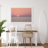 A fine art abstract ocean sunset print featuring rich shades of red, orange, and pink. This ocean wall art will add warmth and beauty to any room in your home.