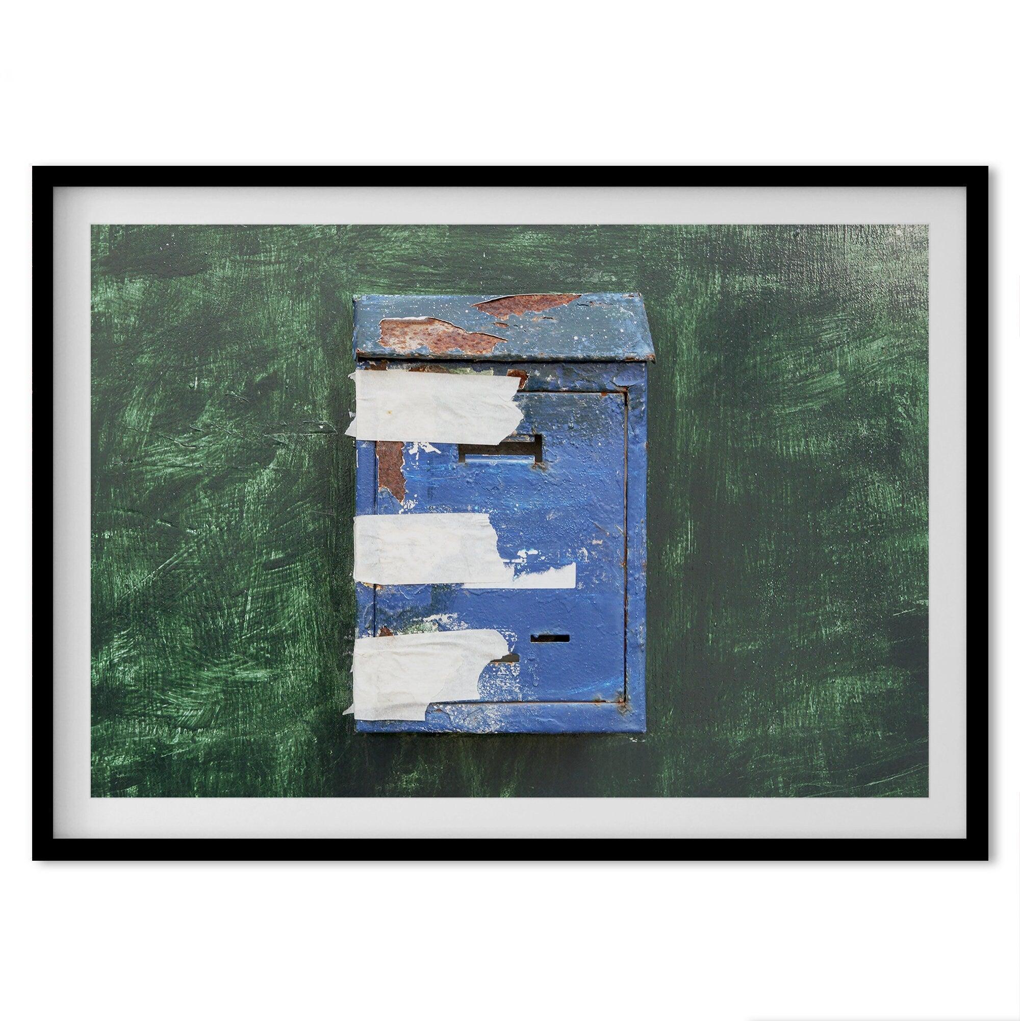 A fine art minimalist photography print of a rustic blue Mediterranean mail box on a green washed-out wall. great color addition to your wall decor.