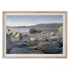 This breathtaking fine art Lake Tahoe print captures the perfect shape of the huge rocks that rise from the crystal-clear water, creating a beautiful contrast against the blue sky and the distant mountain range.