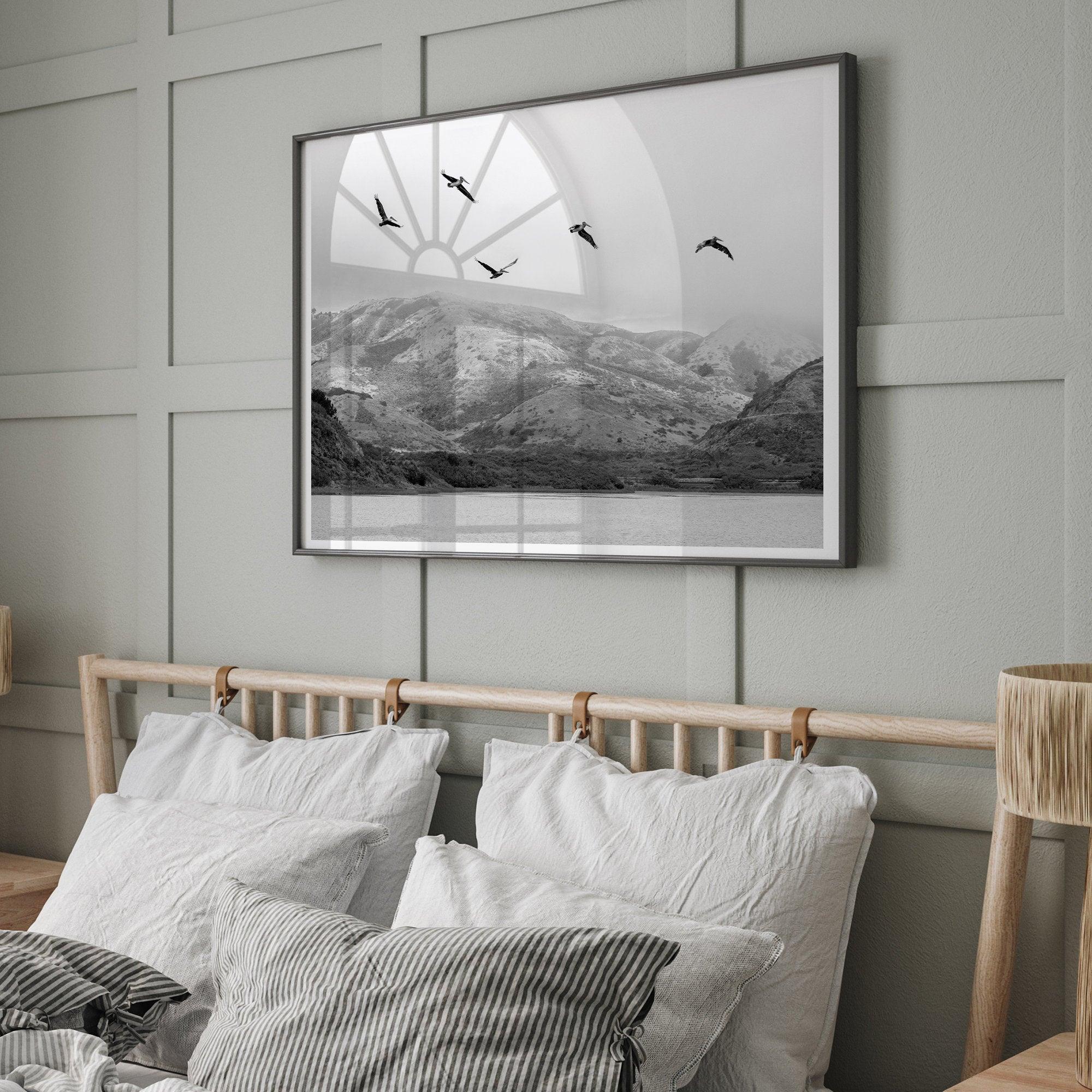 A Fine art black and white beach print of a California beach lagoon with foggy coastal mountains, and pelicans in flight - modern coastal wall art for beach house decor