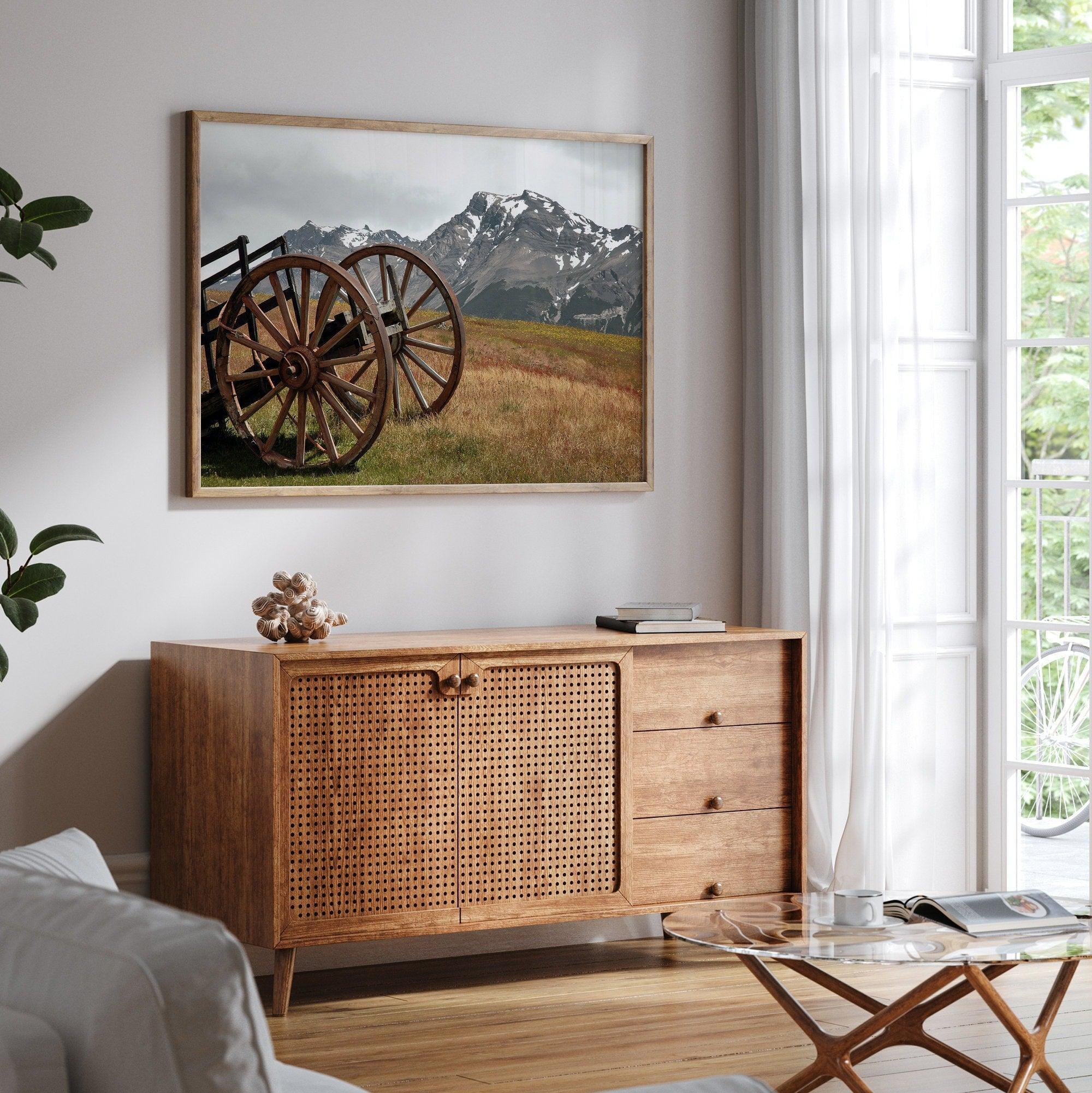 A fine art print of an old plower in the meadows of Patagonia, Argentina, with the backdrop of snow-covered mountains.