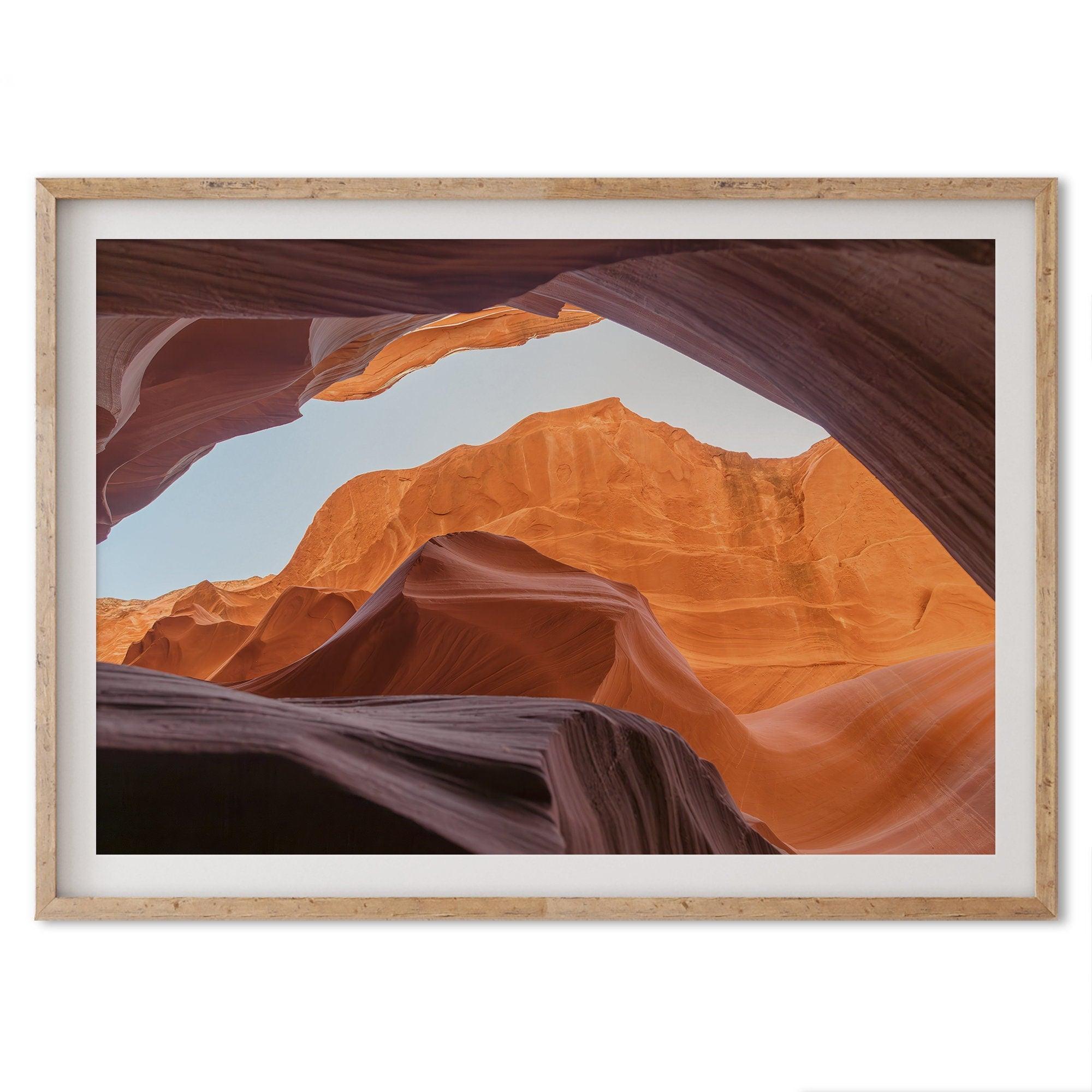 A framed fine art Arizona desert print of Antelope Canyon featuring three layers of rocks in varying colors and creamy textures that create a stunning minimalist desert landscape photography wall art.