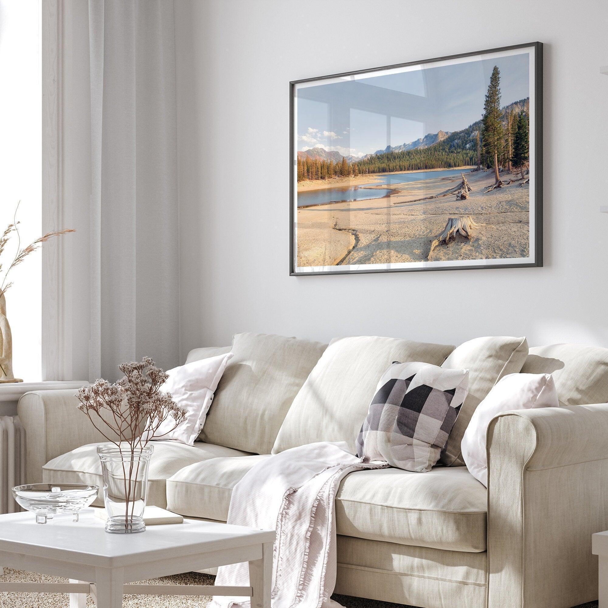 A framed lake print capturing the unique landscape of Horseshoe Lake in the Mammoth Lakes area. This Pacific Northwest wall art showcases the barren ground around the lake and the lush forests and majestic mountains of the Eastern Sierra region.