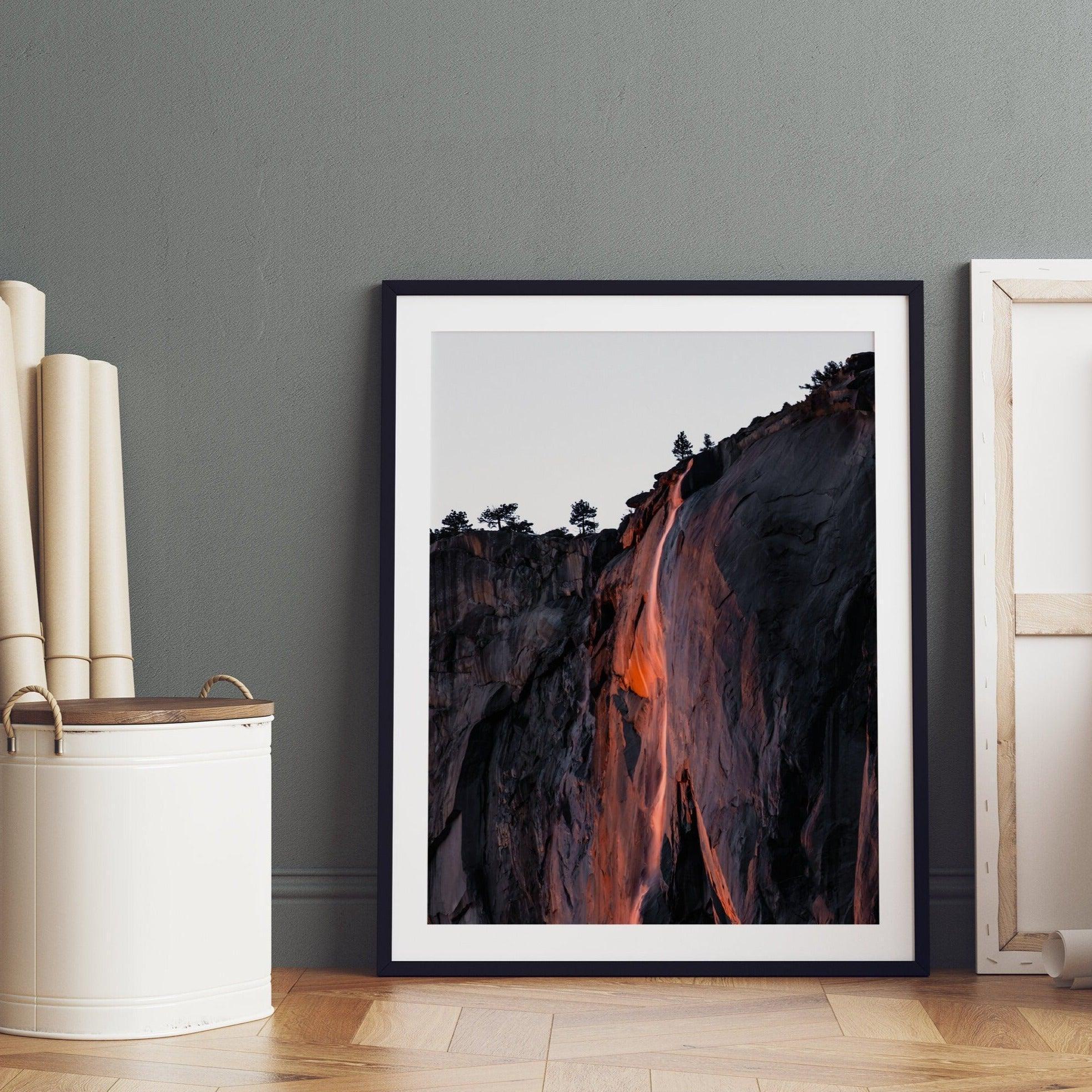 This premium photography framed or unframed fine poster print of Yosemite National Park Firefall - a rare phenomenon where Horsetail Falls in Yosemite seems to be flowing with fire rather than water.