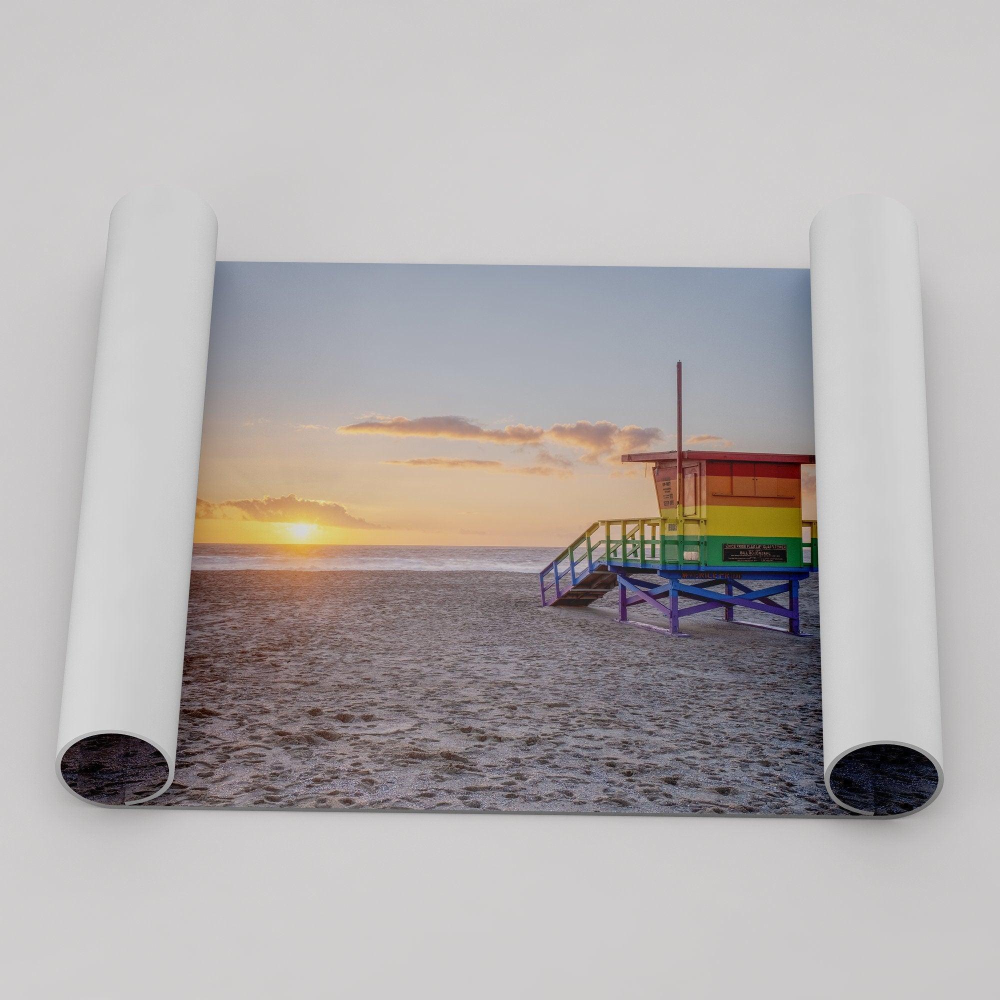 A fine art colorful Los Angeles print featuring Venice Beach at Sunset. This stunning California beach wall art features the famous lifeguard towers of Venice Beach at sunset with the ocean in the backdrop.