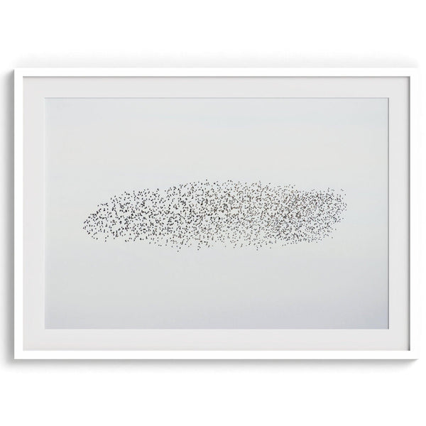 A fine art minimal abstract nature print featuring a geometrical bird flock flying over the Pacific Ocean. Perfect gift for nature lovers or people seeking minimalist nature photography.