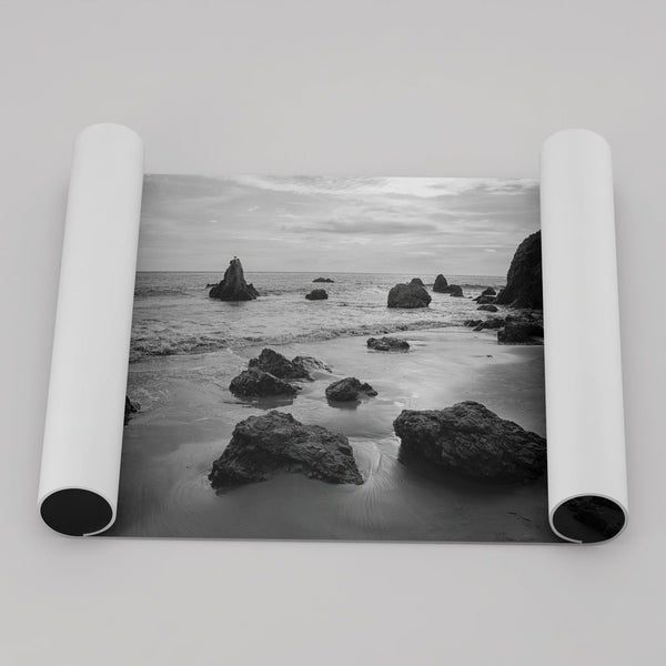 A fine art black and white beach print featuring El Matador State Beach in MalIbu. This southwest coastal decor captures the ragged beauty of the California coast.