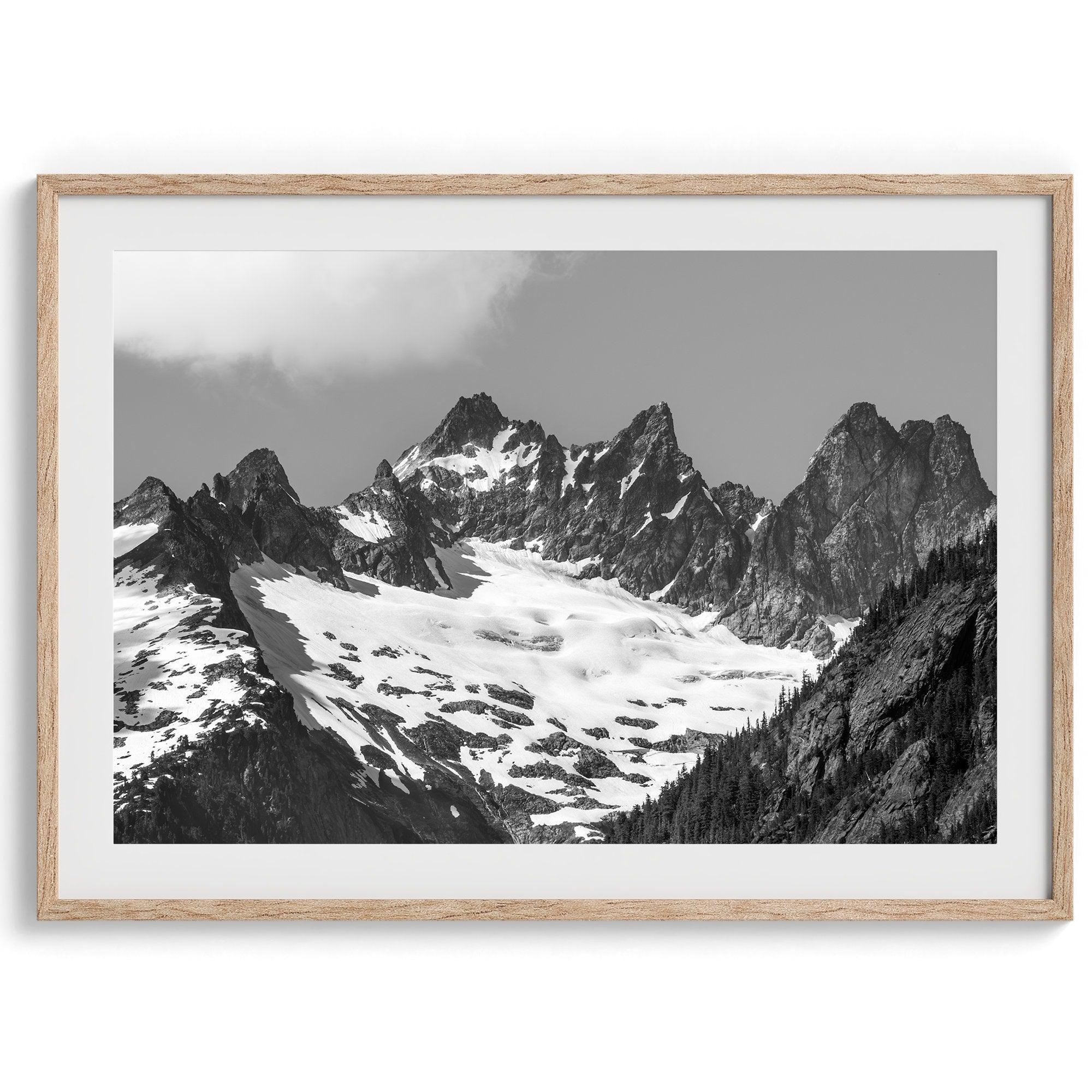 A minimalist black and white unframed or framed photo print of a snowy mountain range in North Cascades National Park, Washington State.