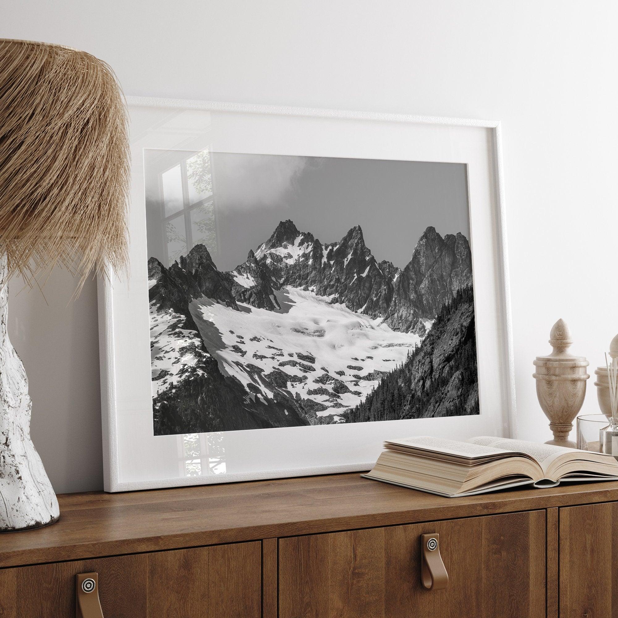 A minimalist black and white unframed or framed photo print of a snowy mountain range in North Cascades National Park, Washington State.