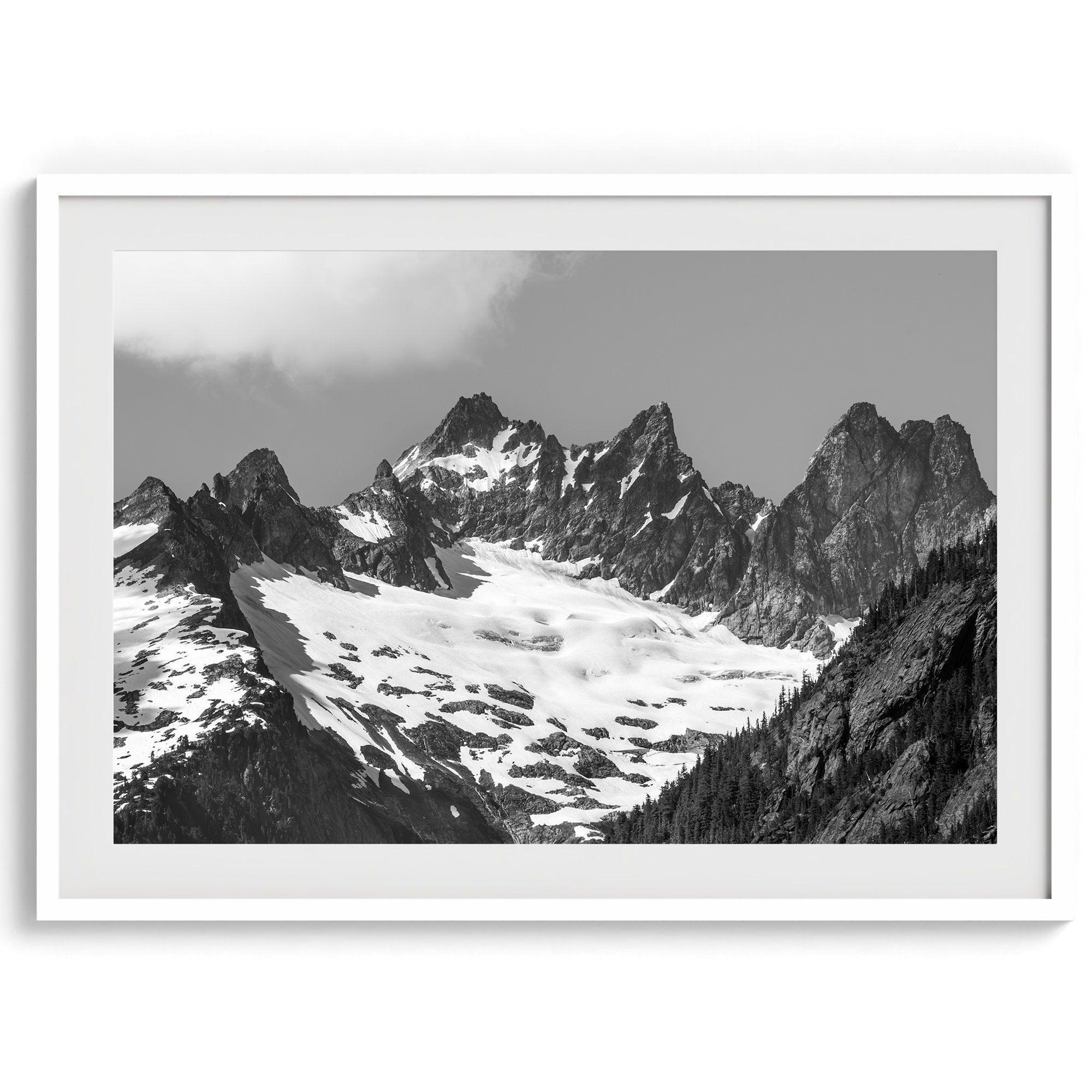 A minimalist black and white unframed or framed photo print of a snowy mountain range in North Cascades National Park, Washington State.