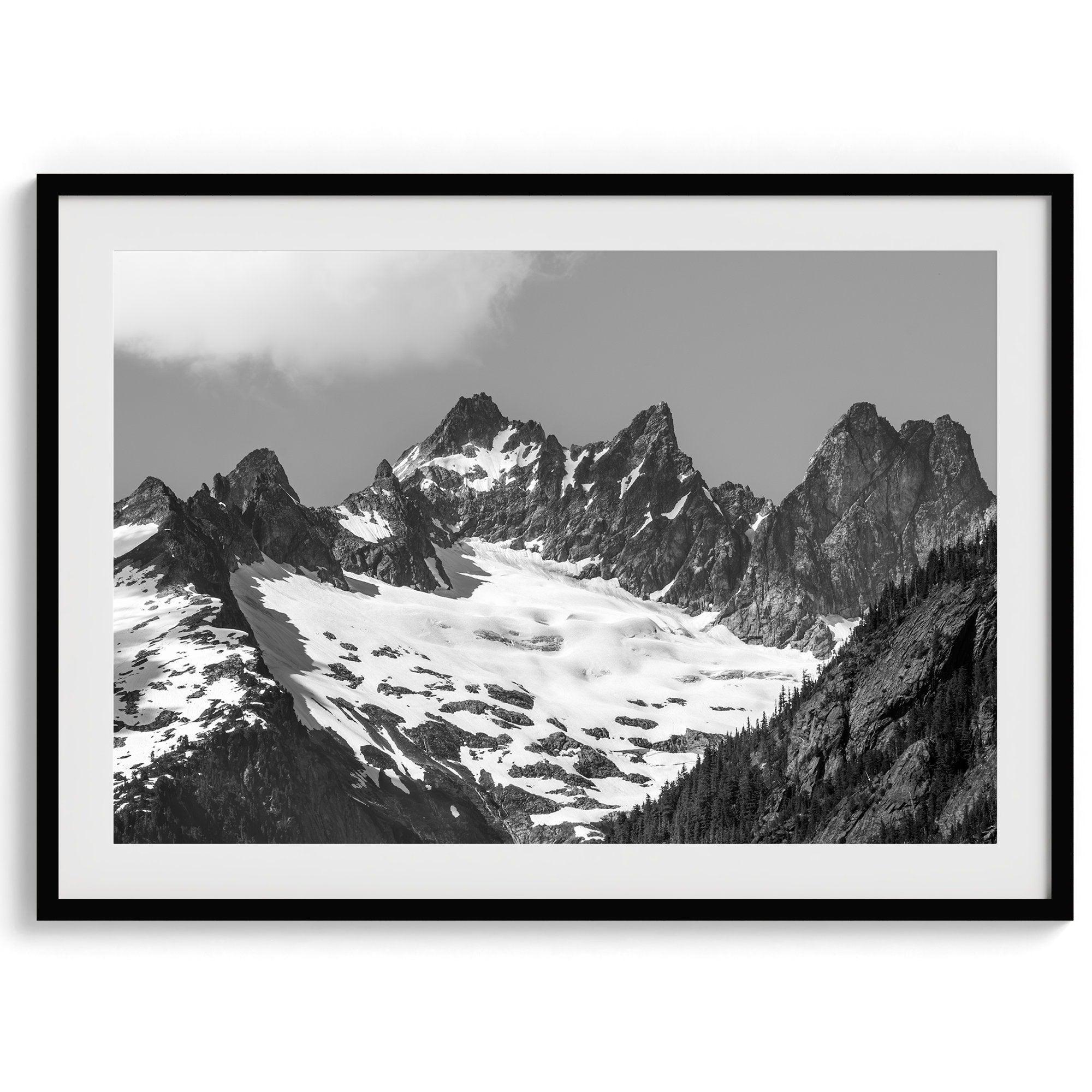 A minimalist black and white unframed or framed photo print of a snowy mountain range in North Cascades National Park, Washington State.