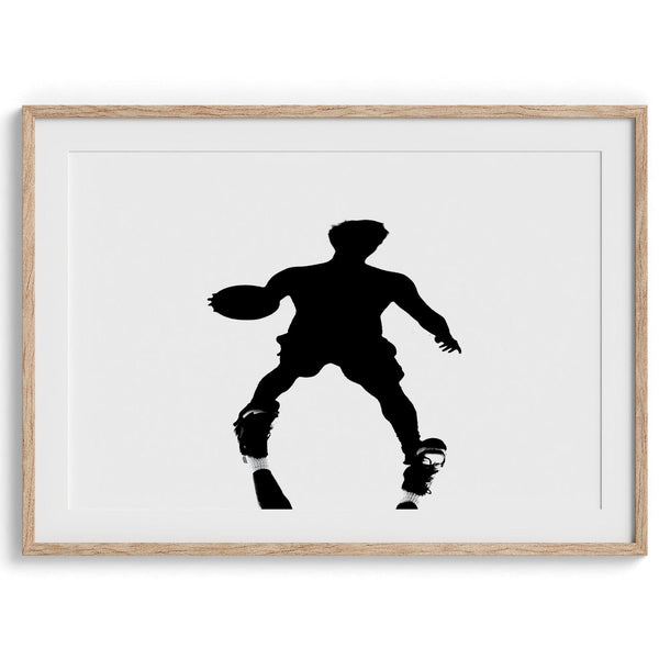 Black and white fine art photography poster print of a basketball player&#39;s shadow dribbling a ball on a sunny court.